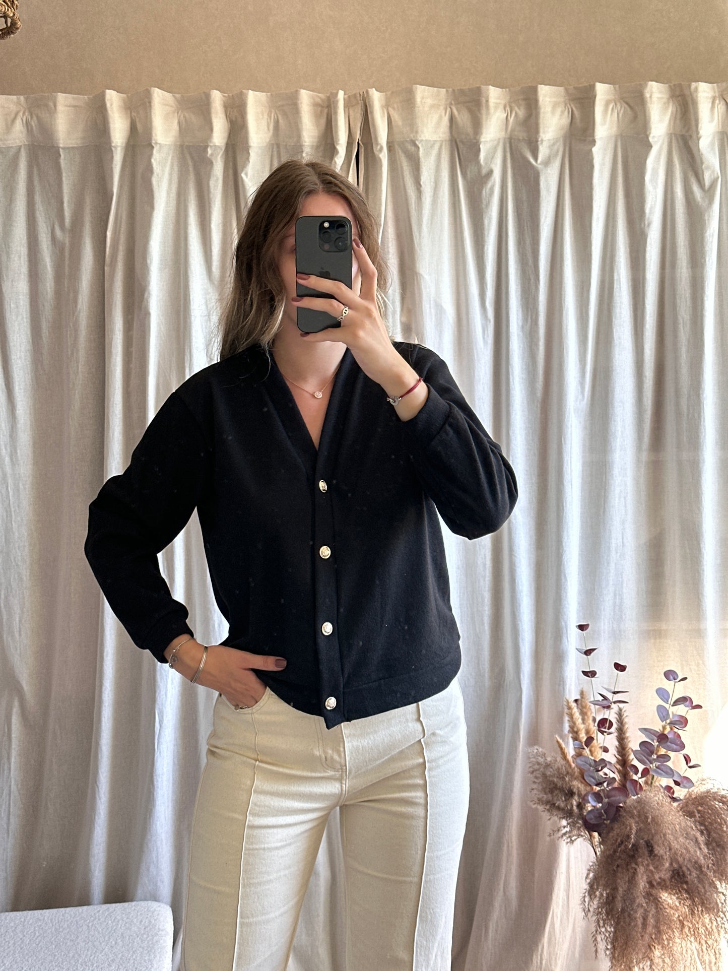 Gilet noir à boutons