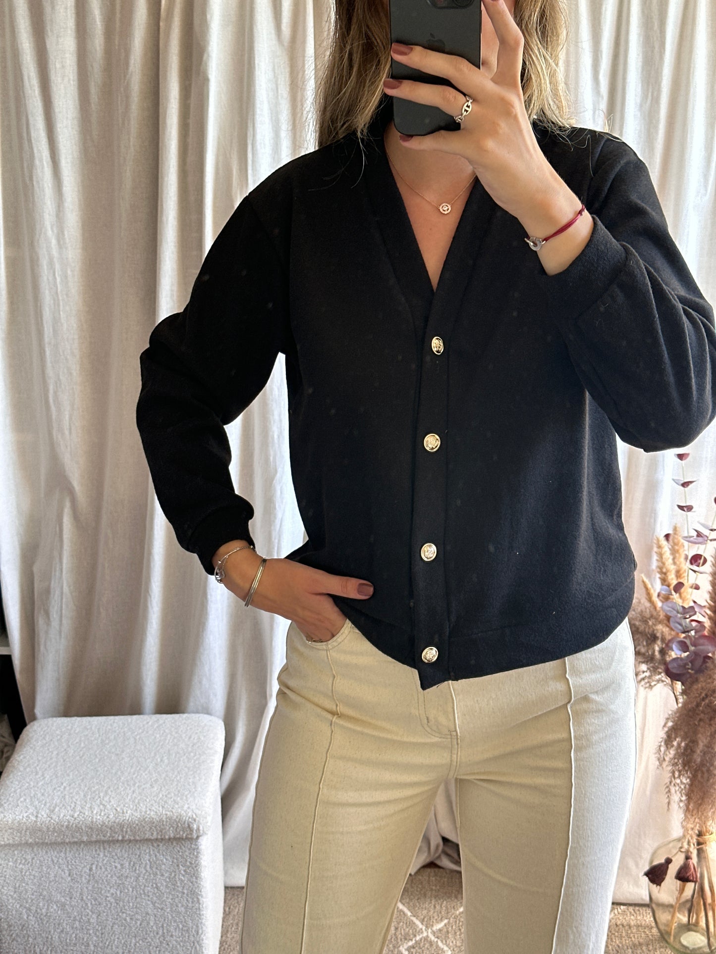 Gilet noir à boutons
