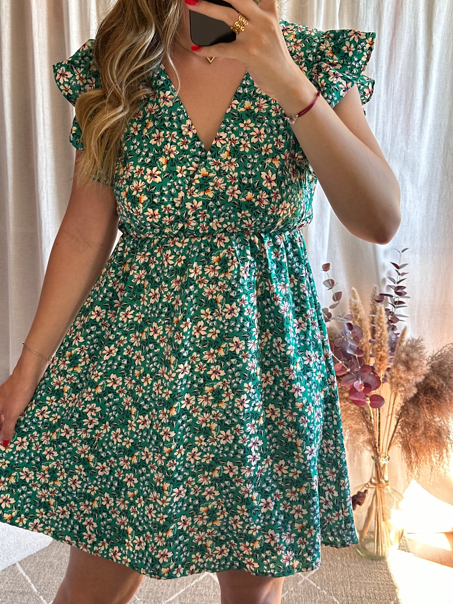 Robe courte verte à fleurs