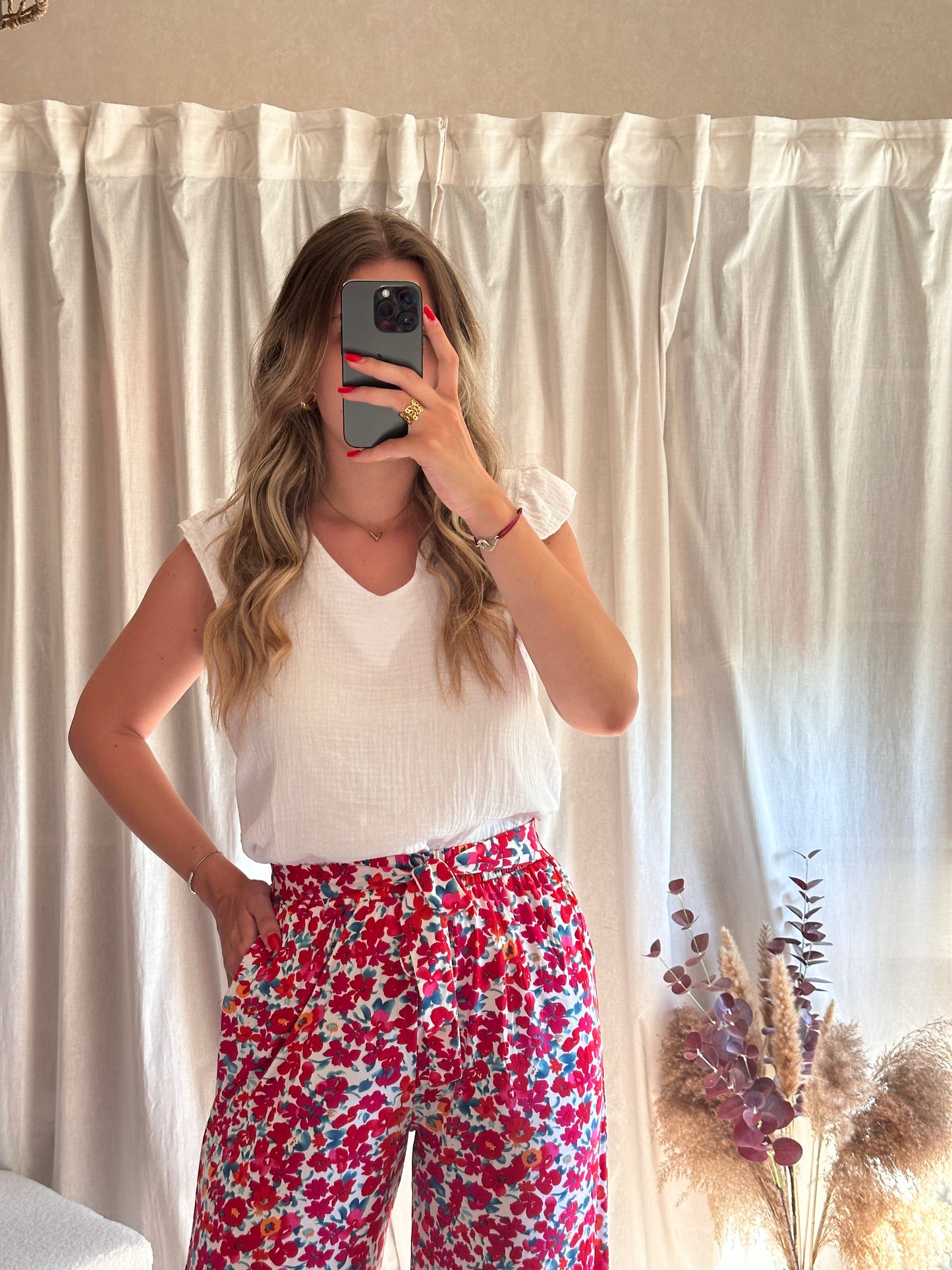 Pantalon fluide rouge motif fleurs