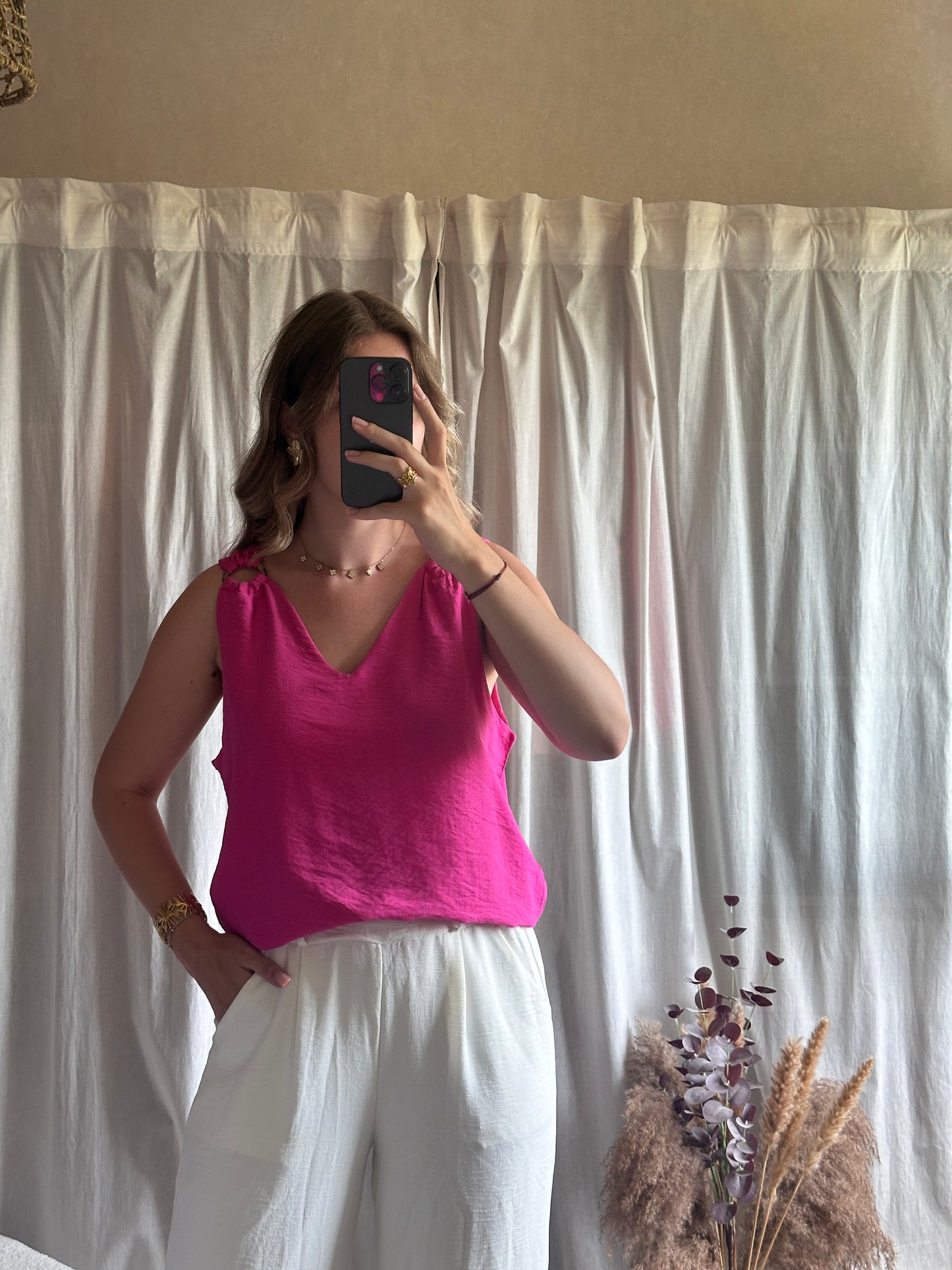 Top col V bretelles anneaux fuchsia