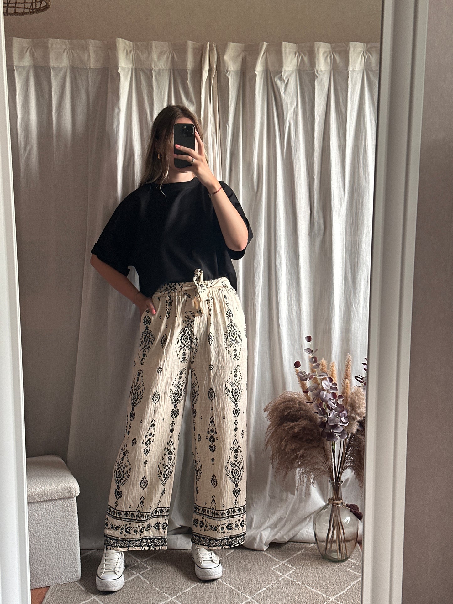Pantalon fluide imprimé beige et noir