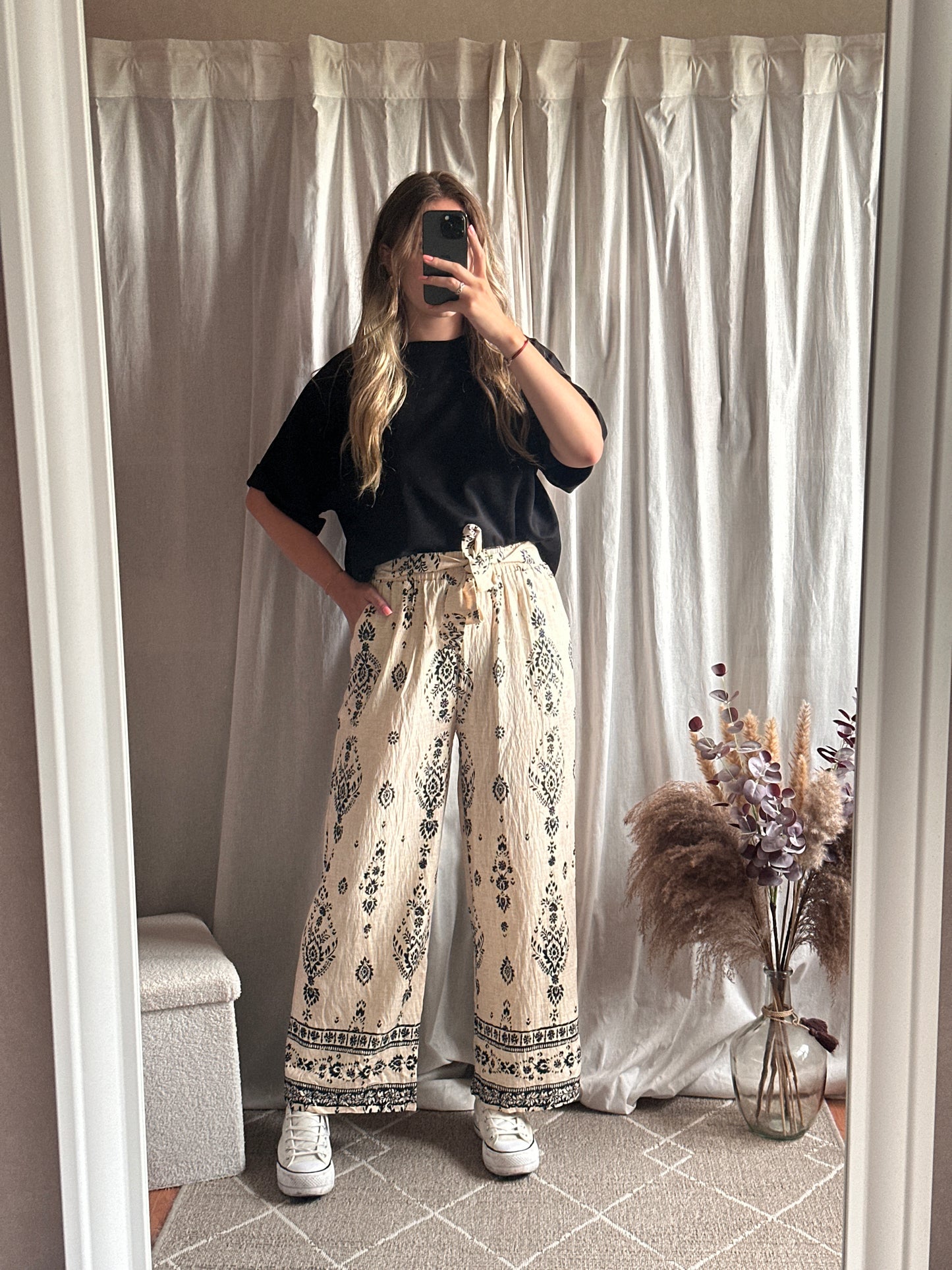 Pantalon fluide imprimé beige et noir