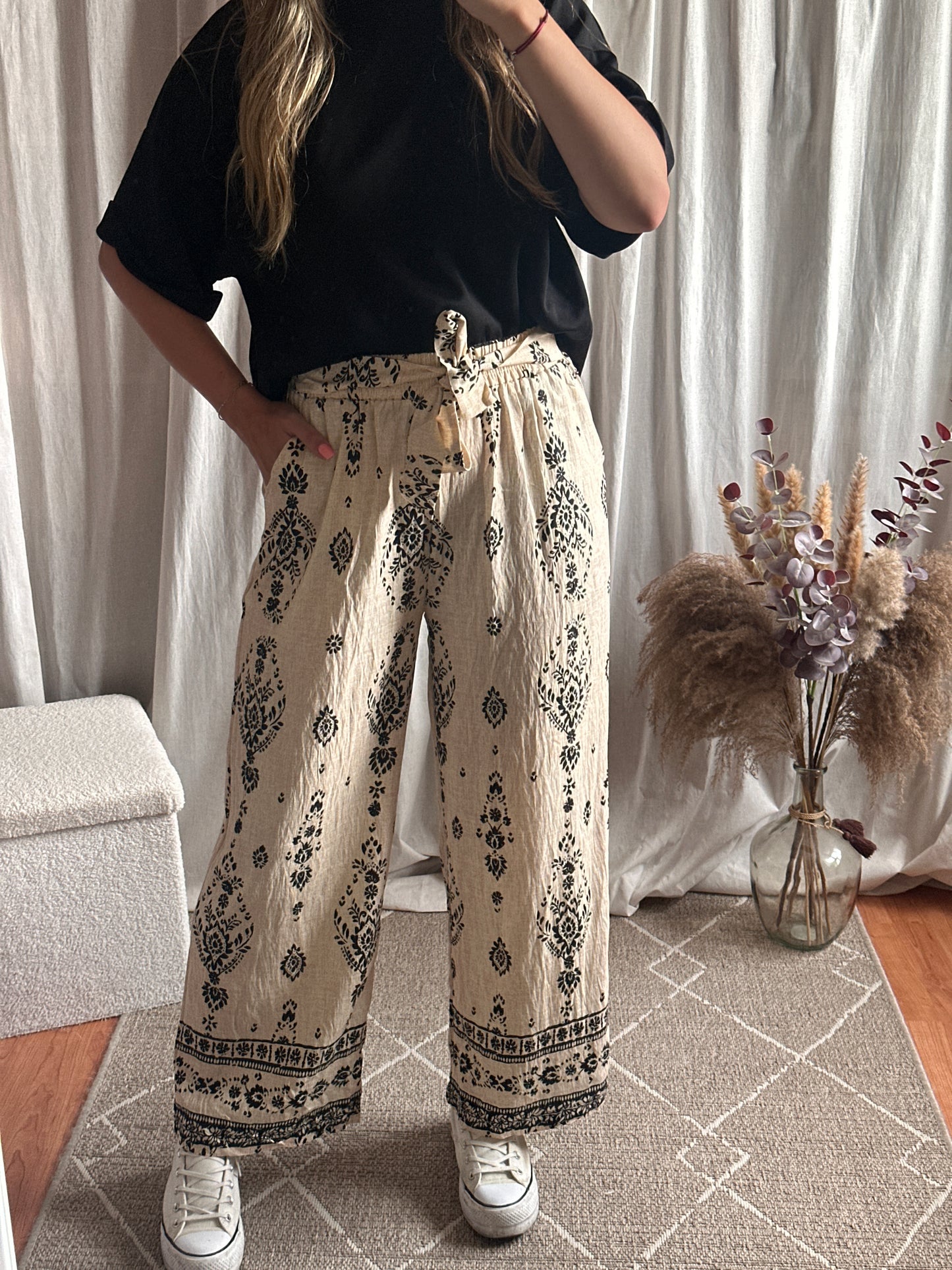 Pantalon fluide imprimé beige et noir