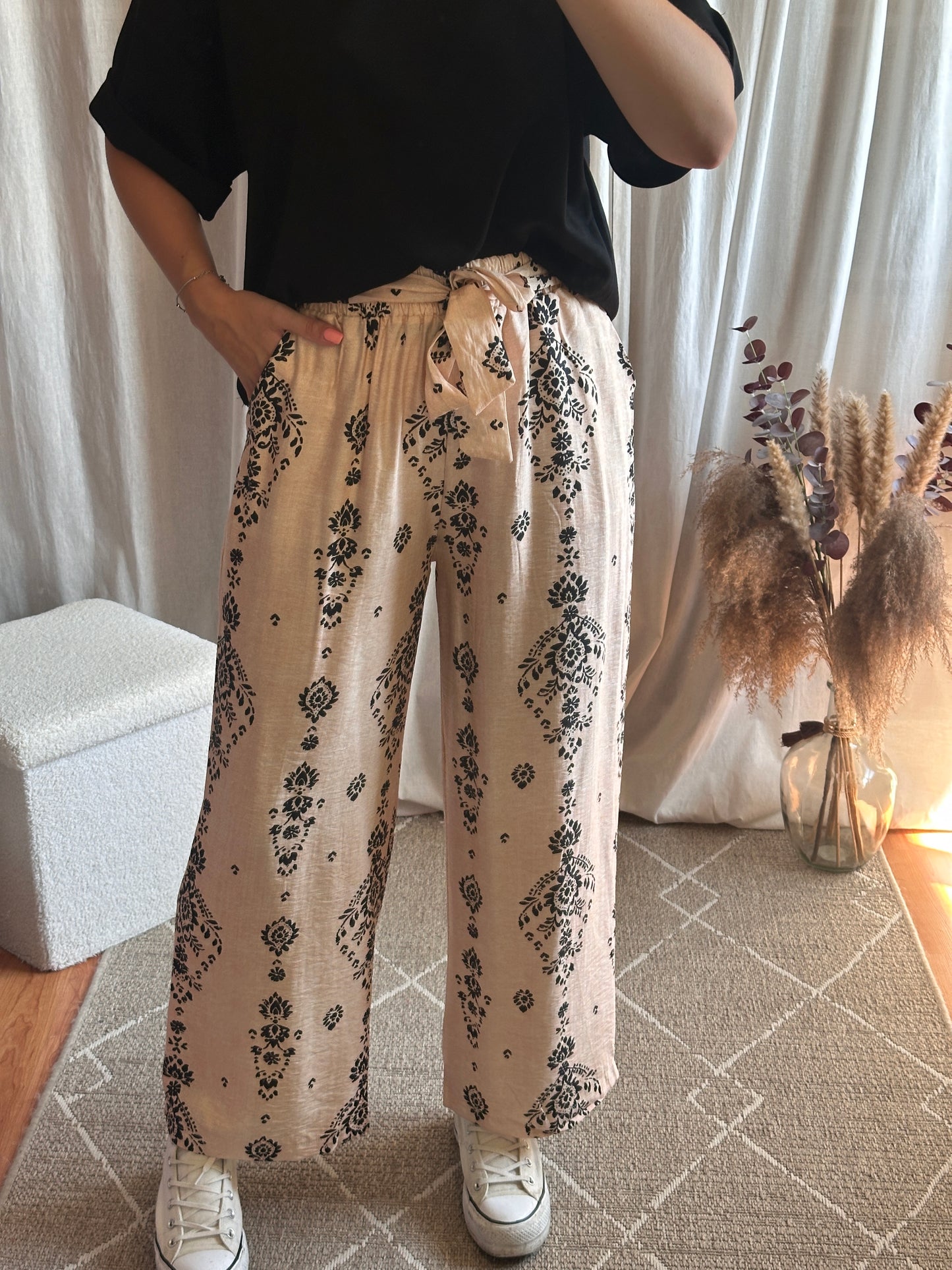 Pantalon fluide imprimé beige et noir
