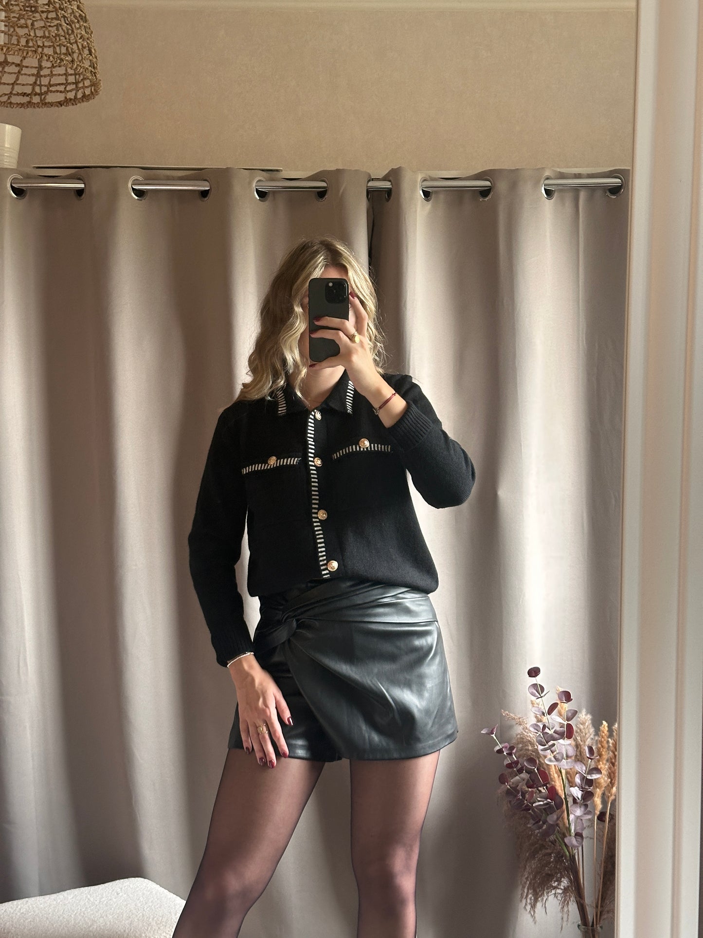 Gilet noir coutures blanches