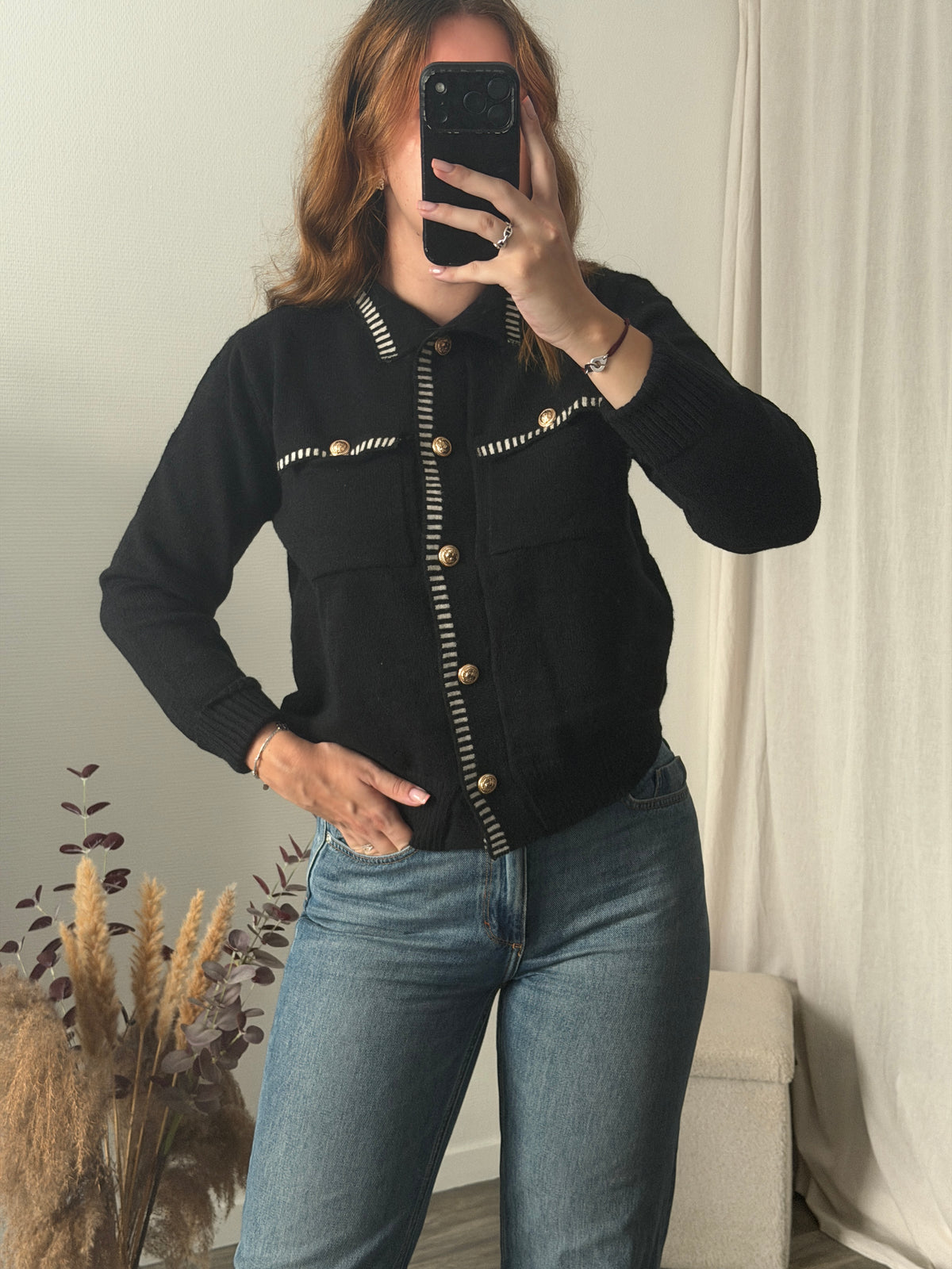 Gilet noir coutures blanches