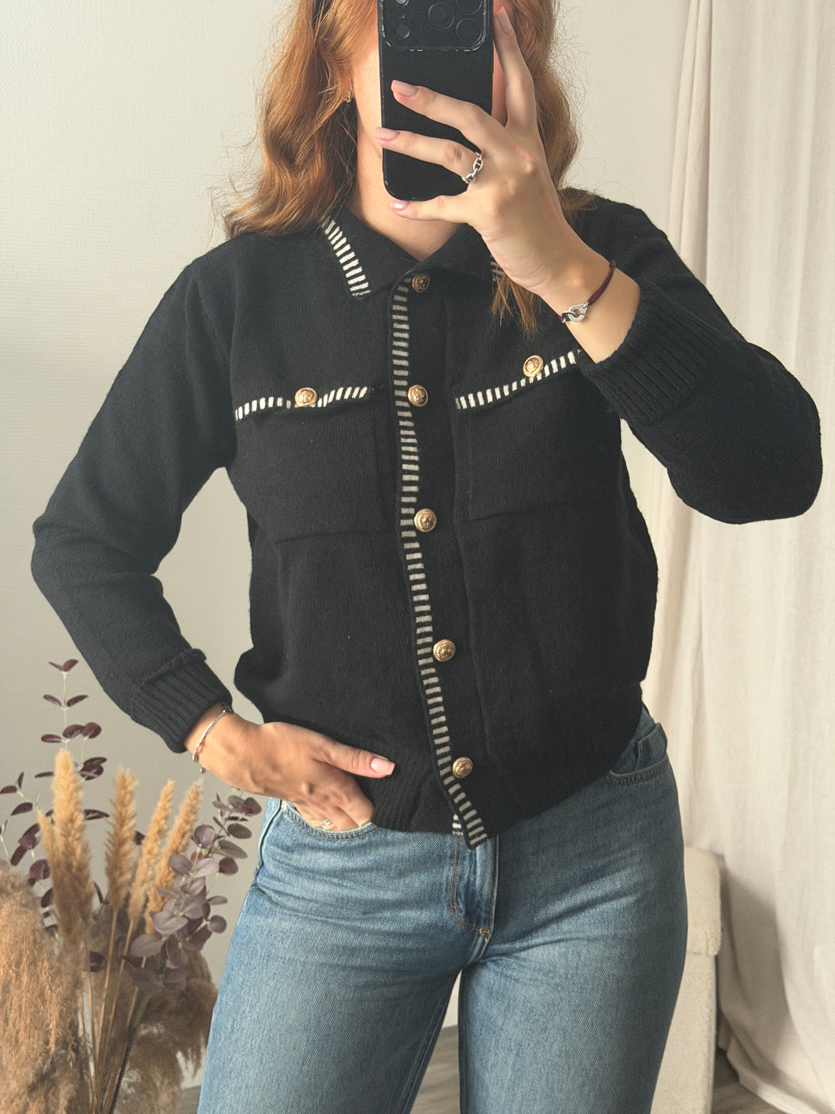 Gilet noir coutures blanches