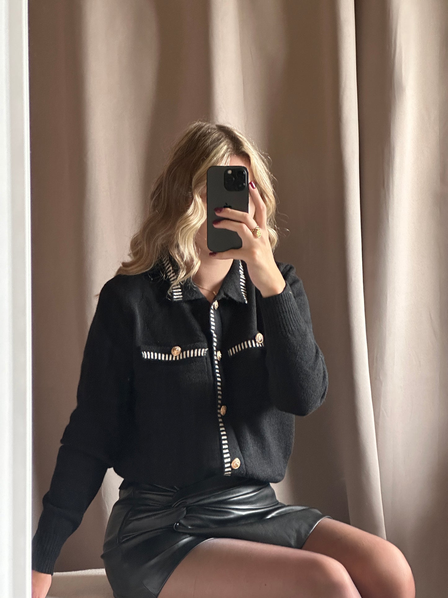 Gilet noir coutures blanches